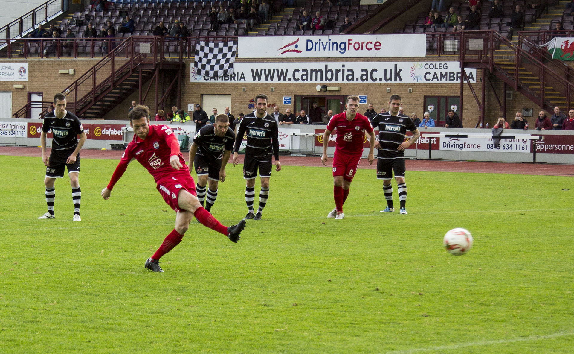 Matty Williams levels from the penalty spot for The Nomads