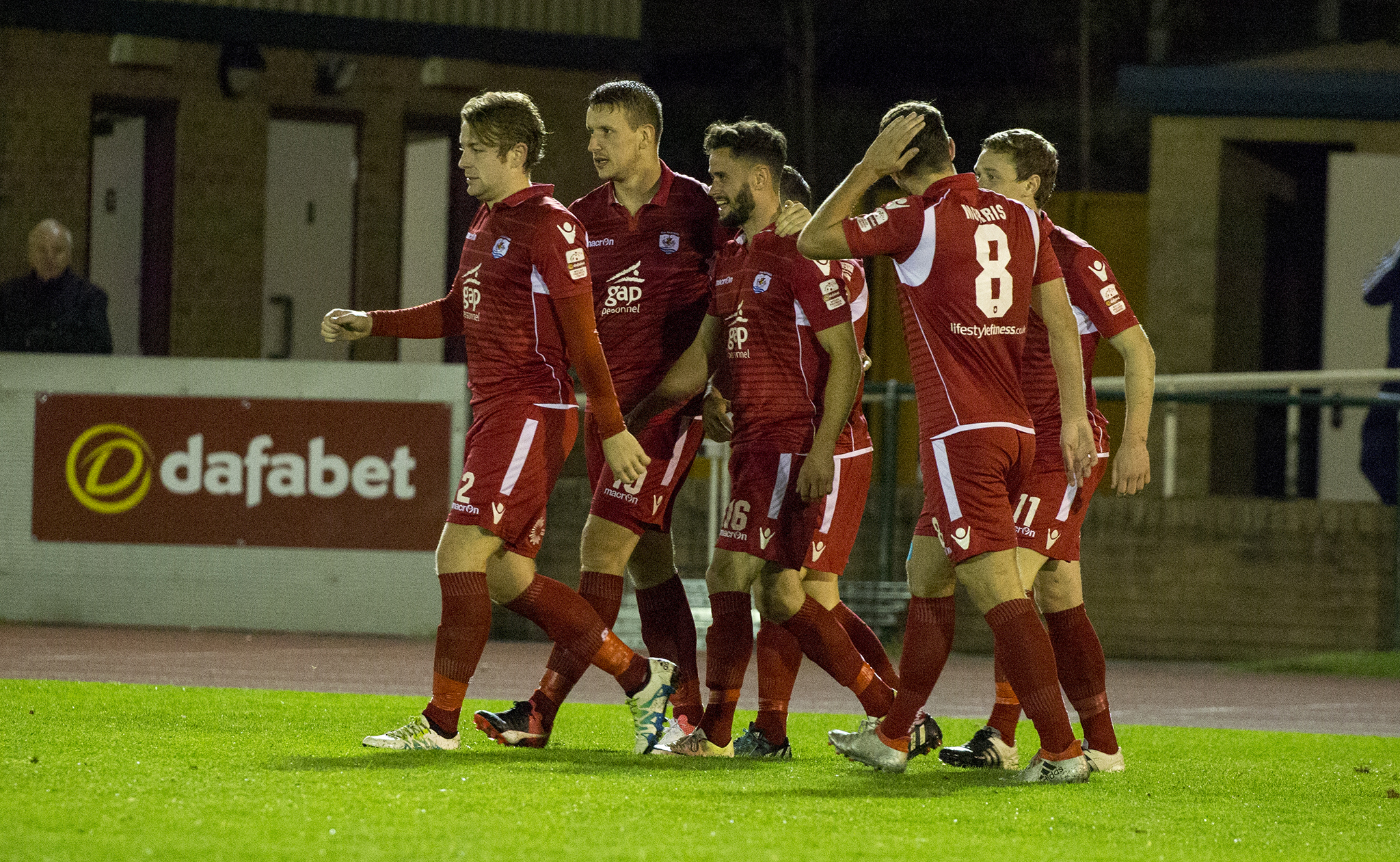 The Nomads celebrate Nathan Woolfe's opening goal - © NCM Media