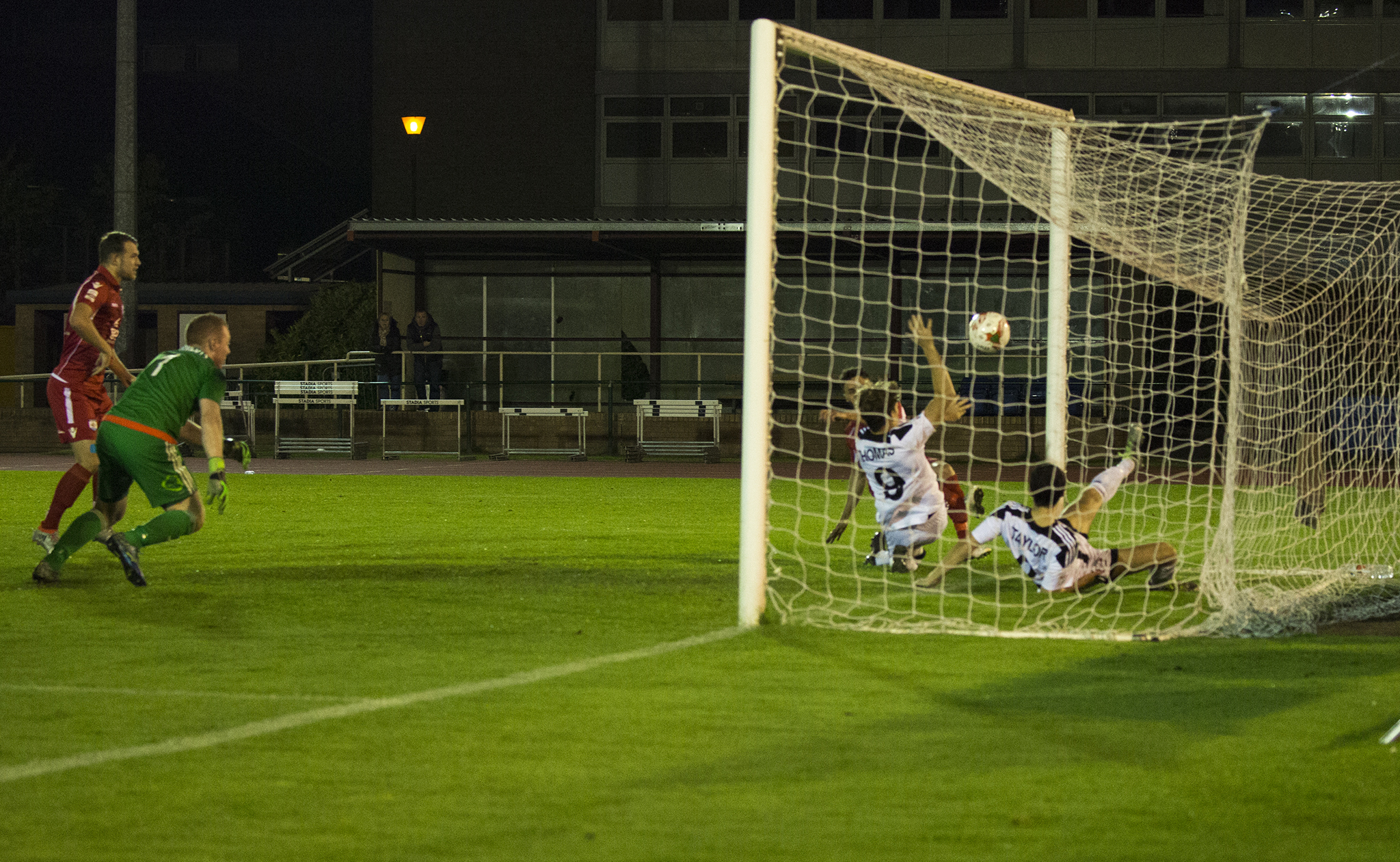 Nathan Woolfe scores from close range for The Nomads - © NCM Media