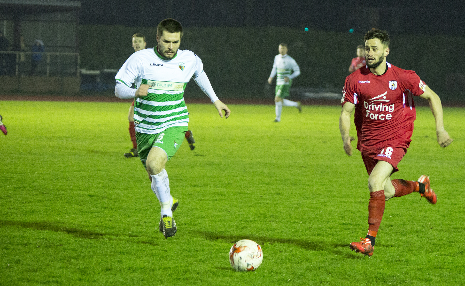 Kai Edwards (left) in his time at TNS playing against The Nomads