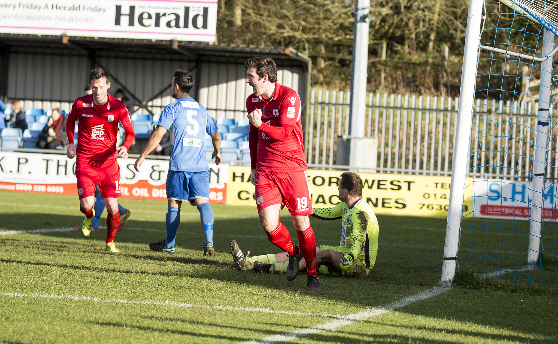 Matty Owen celebrates his goal in the 12th minute - © NCM Media