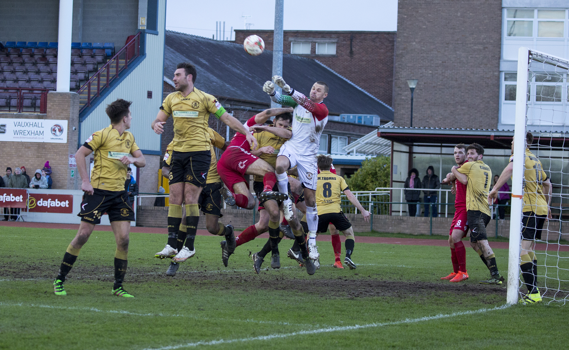 Lee Idzi punches clear for Carmarthen - © NCM Media