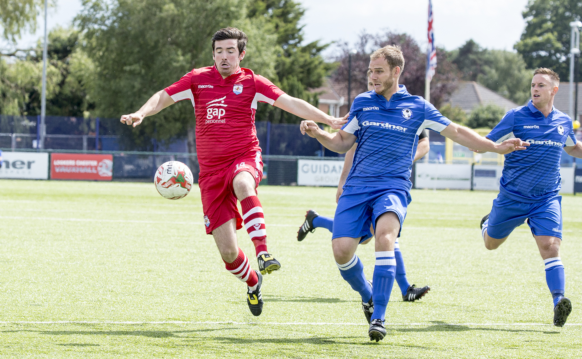 Matty Owen challenges for the ball - © NCM Media