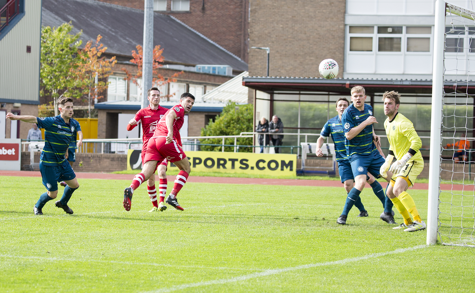 Michael Wilde watches on as his first half header strikes the post - © NCM Media