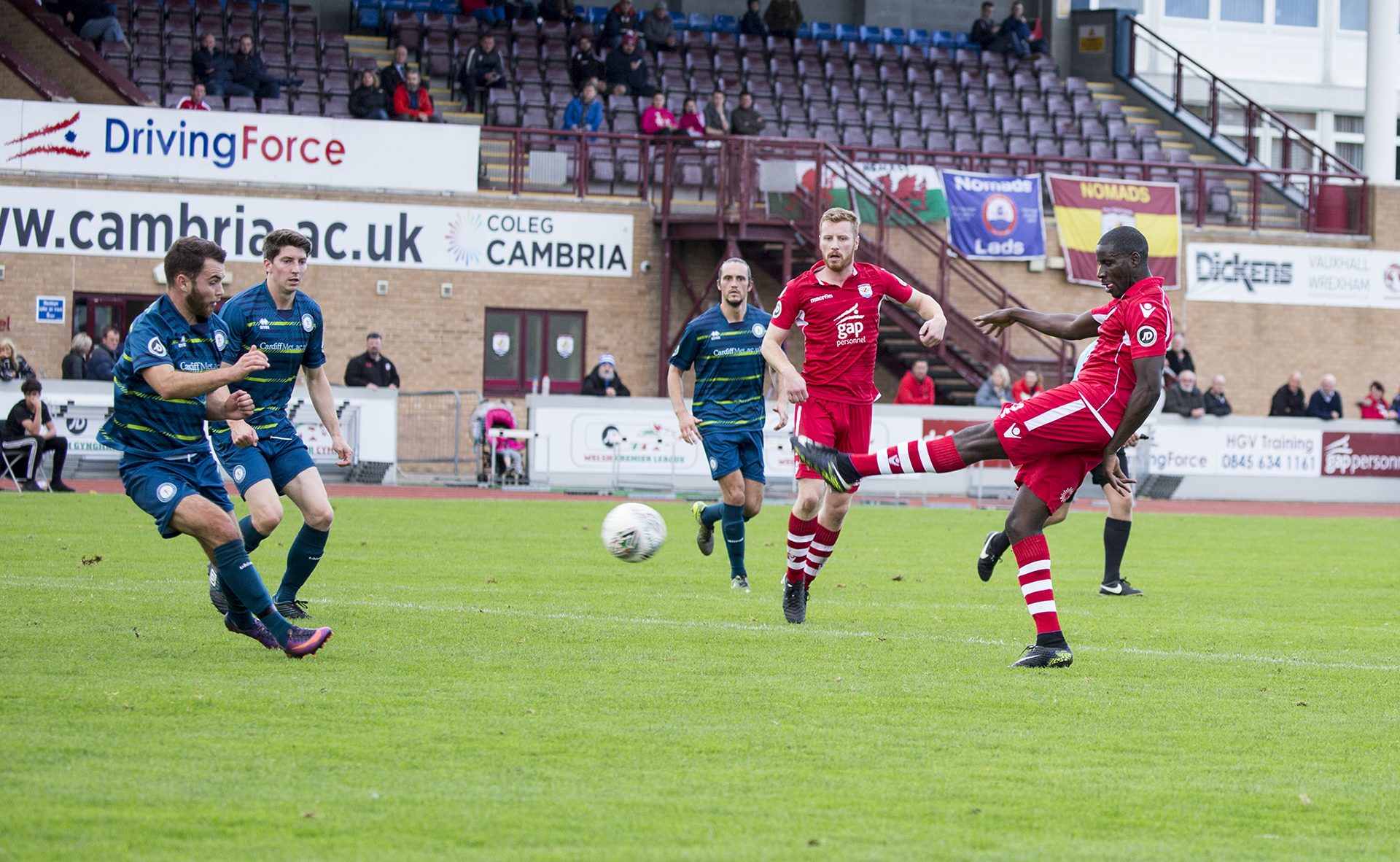 Michael Bakare strikes towards goal in the second half - © NCM Media