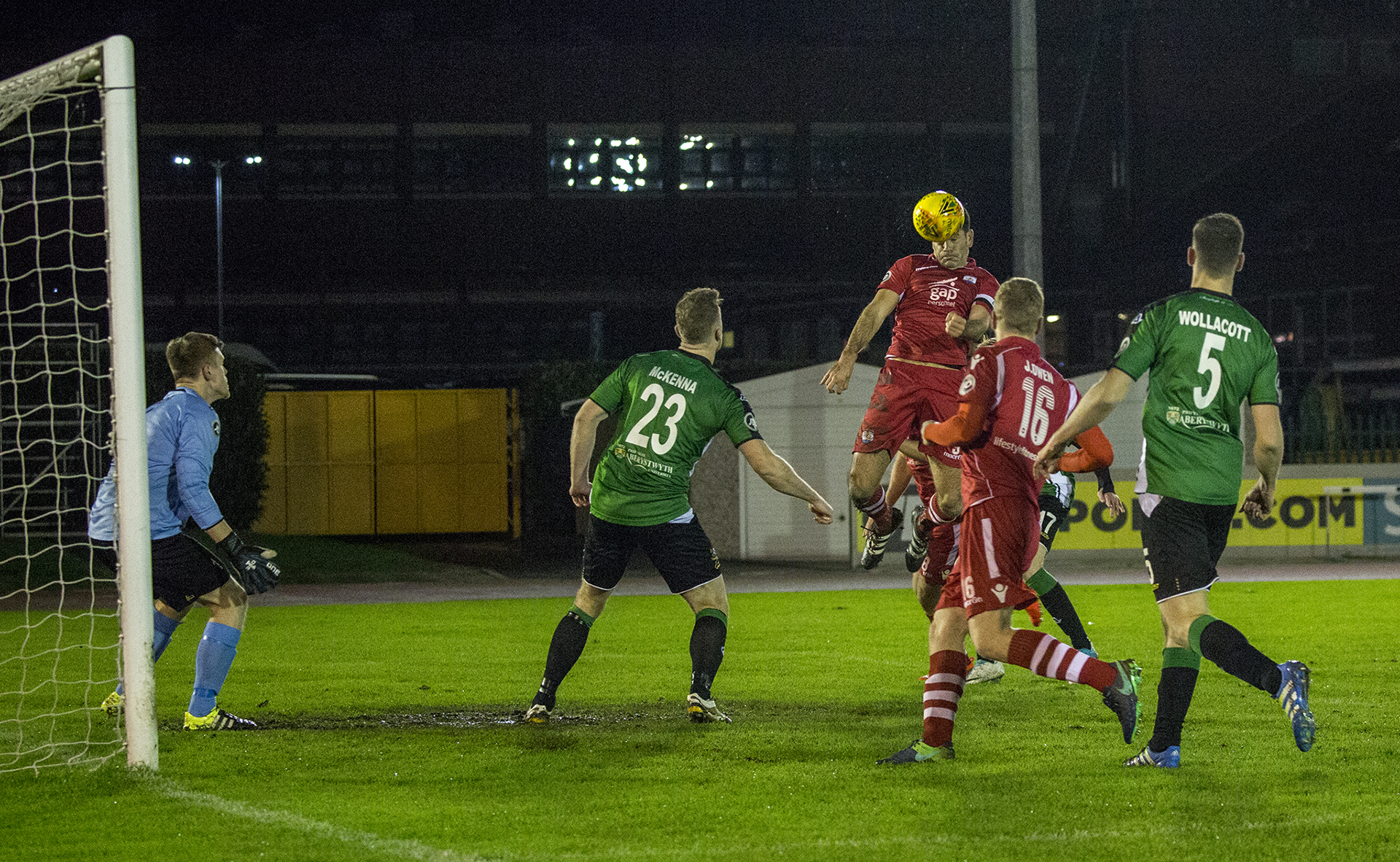 Michael Wilde rises highest to give The Nomads the lead in the seventh minute - © NCM Media