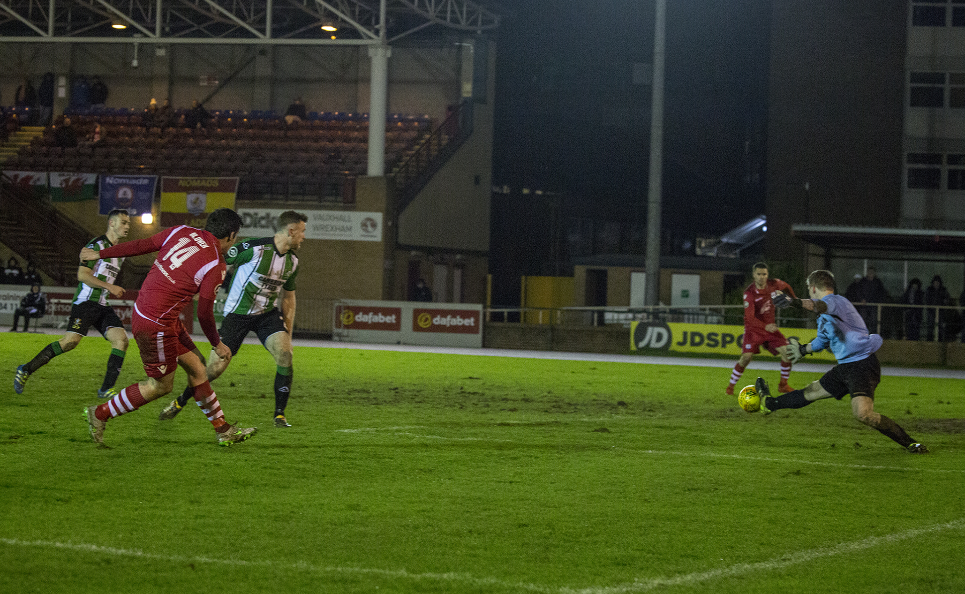 Matty Owen squares a pass to Kai Edwards before he taps in The Nomads' fourth goal of the night - © NCM Media