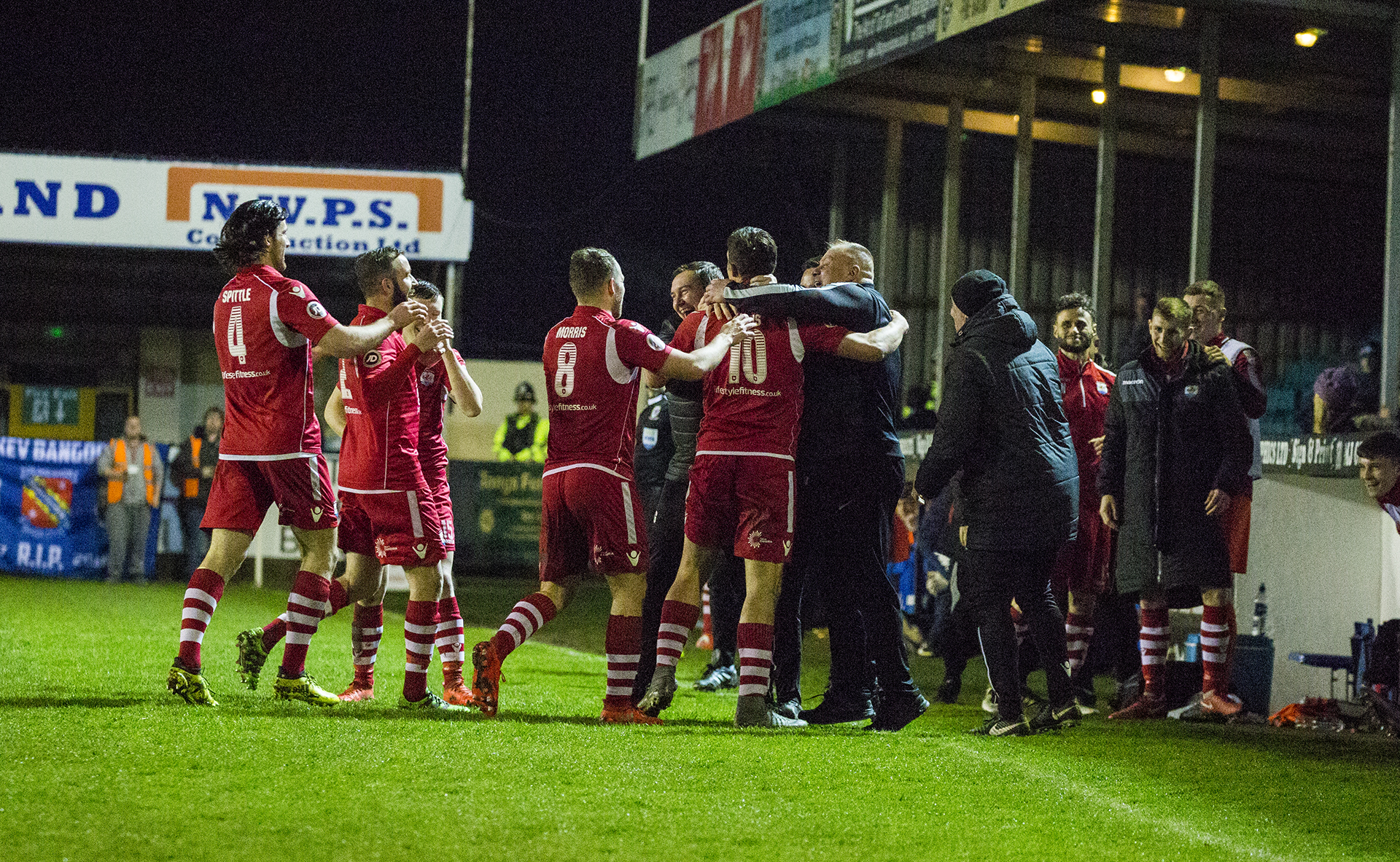 The Nomads celebrate Andy Owens' hattrick goal - © NCM Media