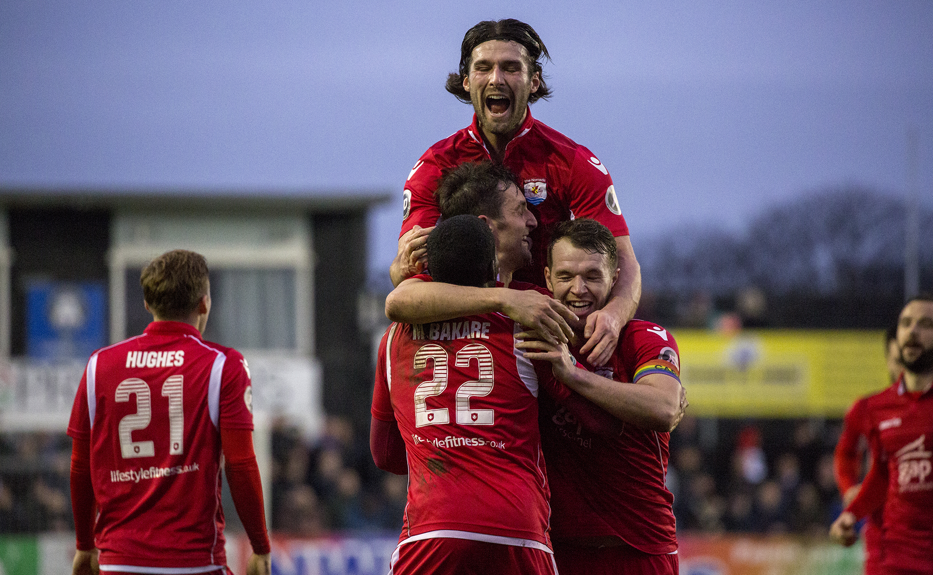 The Nomads celebrate Andy Owens' opening goal - © NCM Media