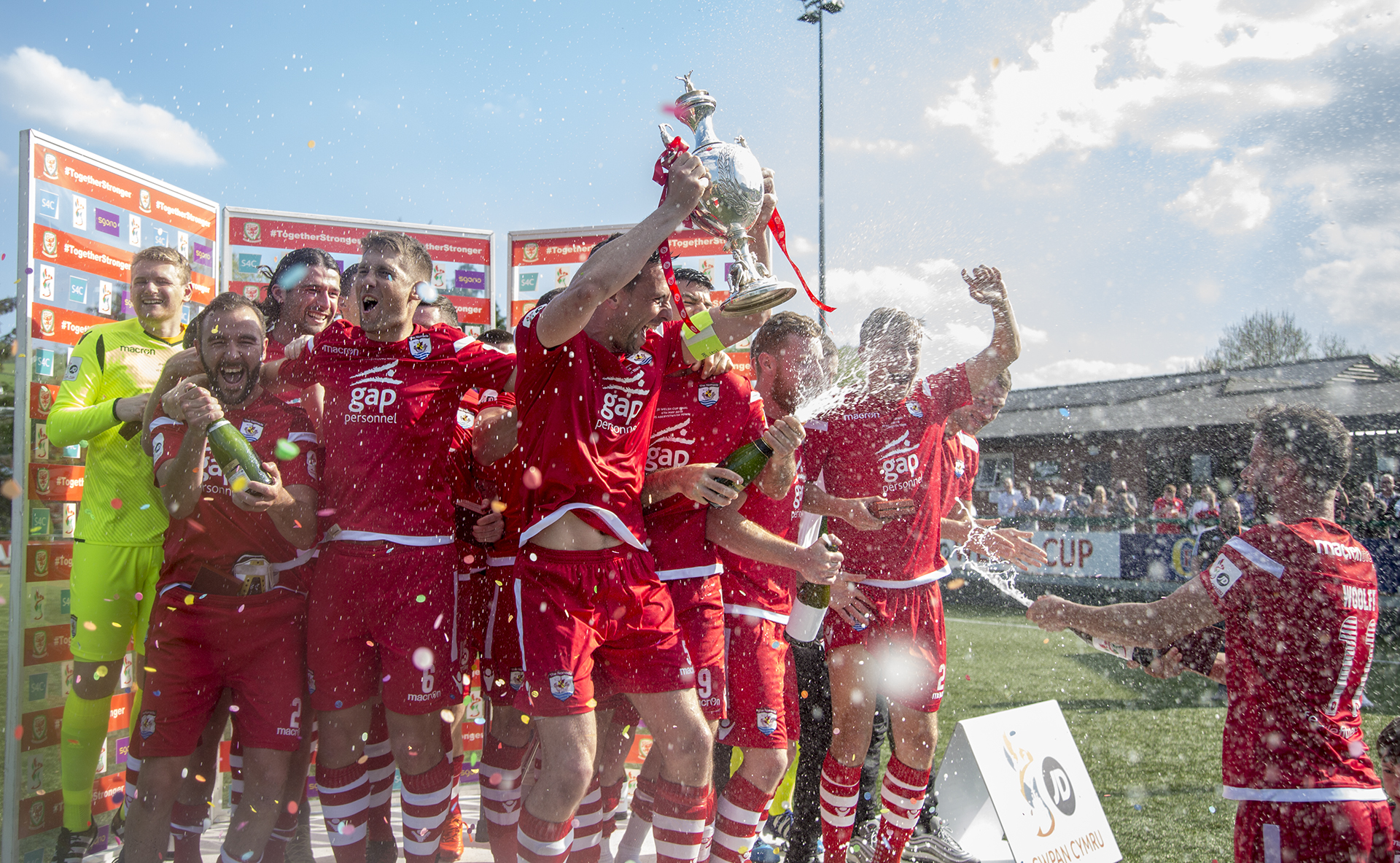 Nomads' captain and Man-of-the-Match, George Horan lifts the Welsh Cup for the first time in the club's history - © NCM Media