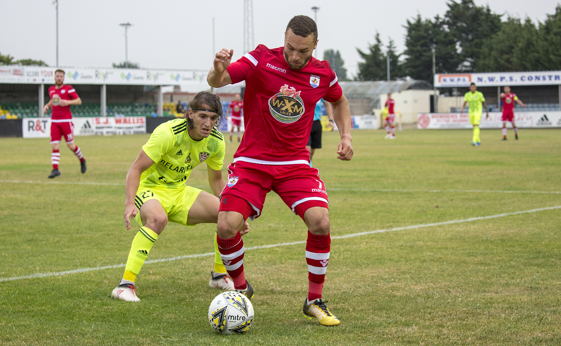 Ryan Wignall keeps a Soligorsk defender at bay © NCM Media