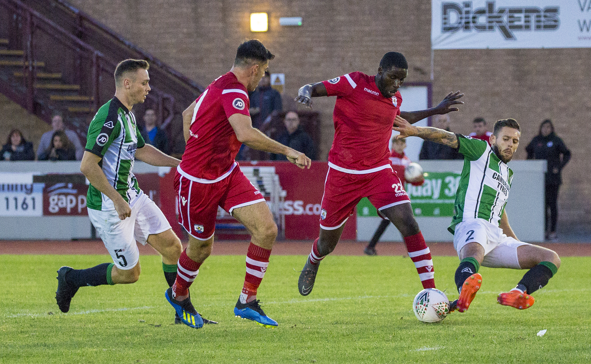 Michael Bakare eludes Aberystwyth's defenders as he looks to score © NCM Media