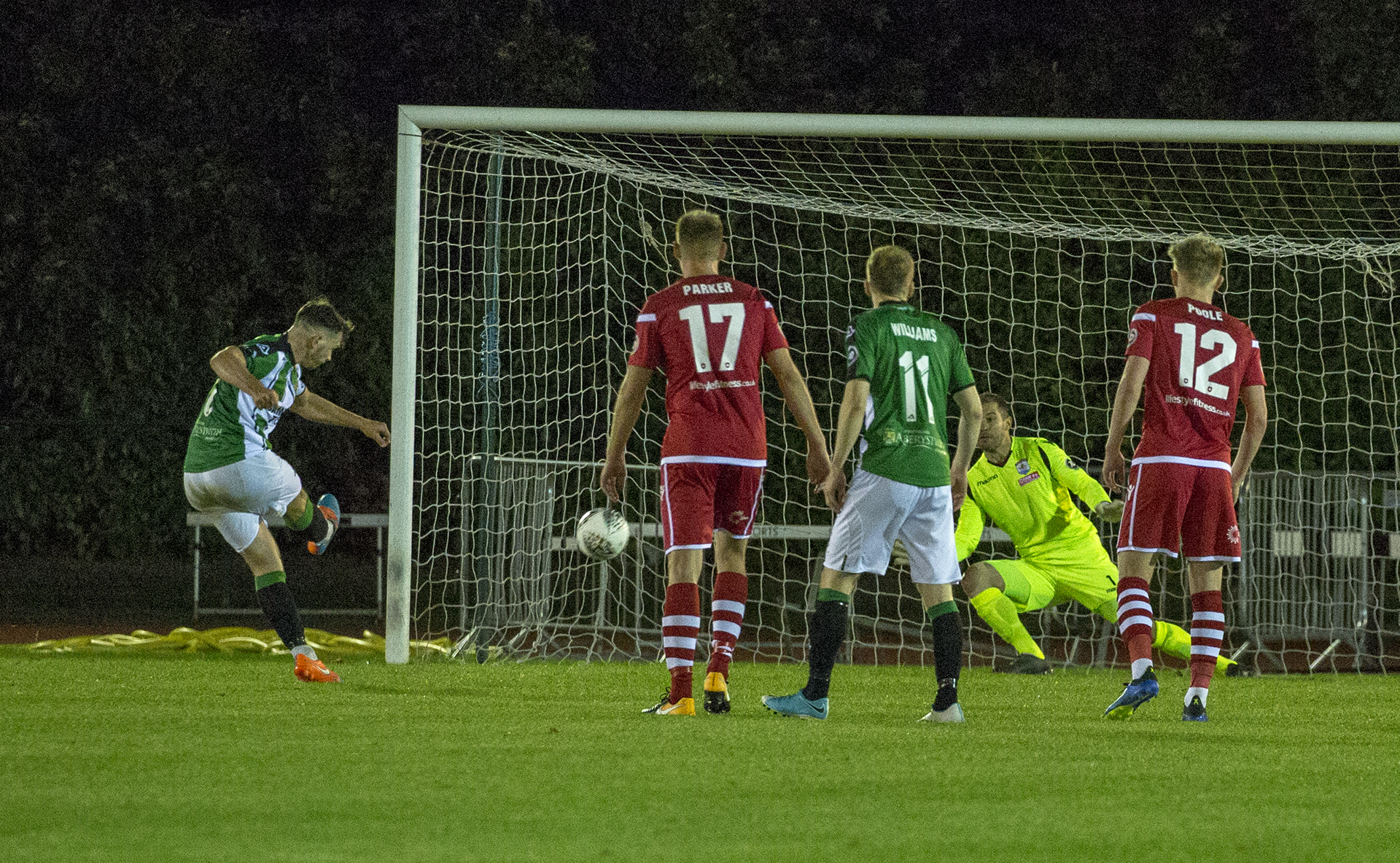 John Danby dives to save Declan Walker's penalty late in the second half © NCM Media