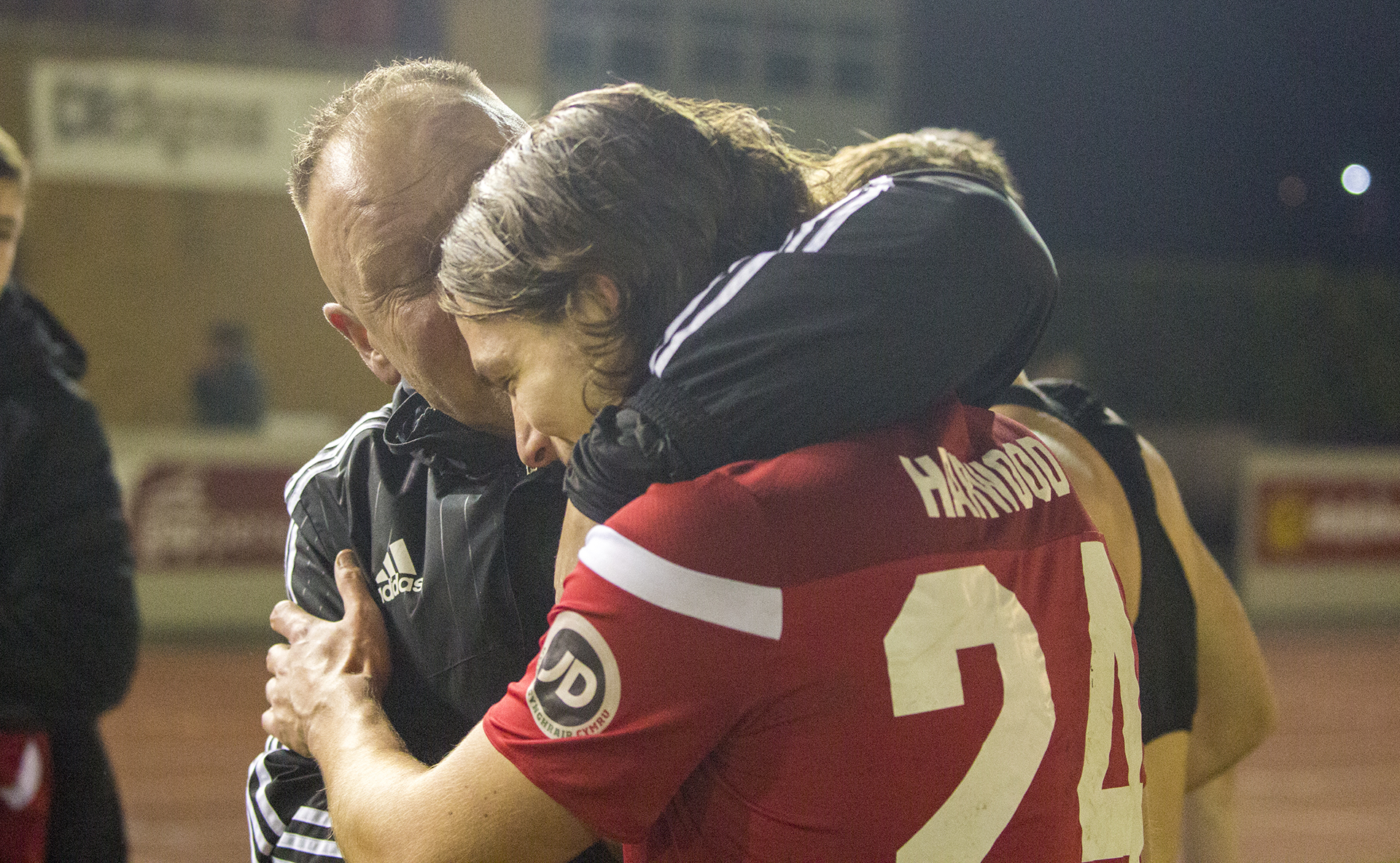 Andy Morrison embraces match-winner Conor Harwood at the full time whistle | © NCM Media