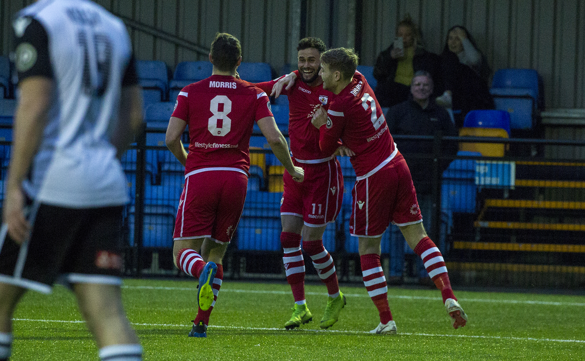 Nathan Woolfe is congratulated by John Disney and Callum Morris | © NCM Media