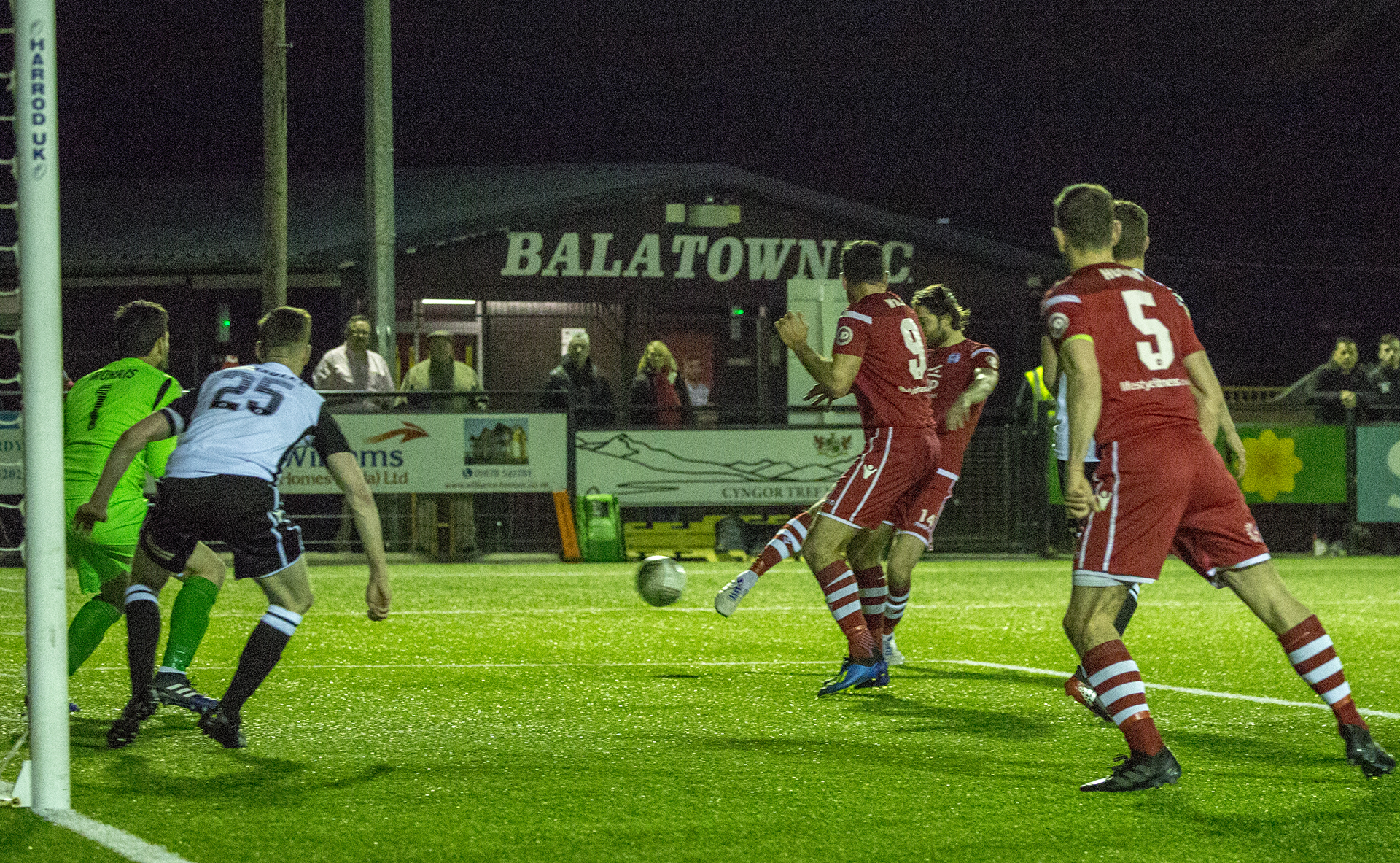 Adam Barton slams home The Nomads' fourth goal | © NCM Media