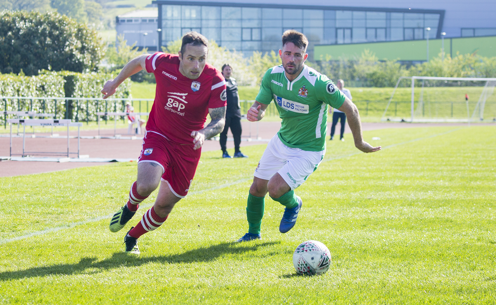 Danny Holmes evades the attentions of the Barry defence | © NCM Media