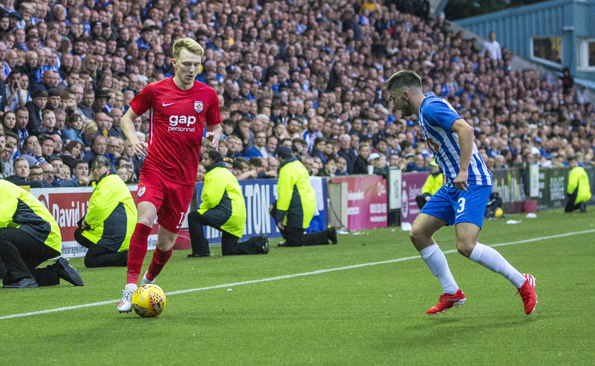 Declan Poole takes on the Killie defence | © NCM Media