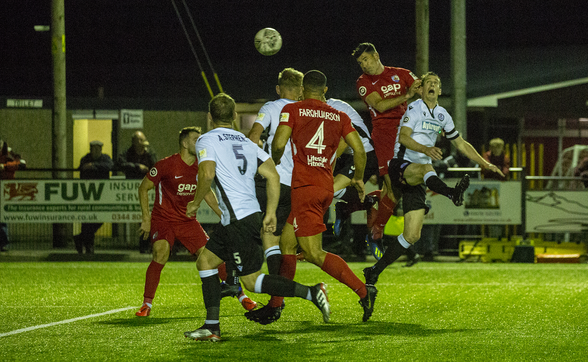 Michael Wilde rises above the Bala defence to head The Nomads in front | © NCM Media
