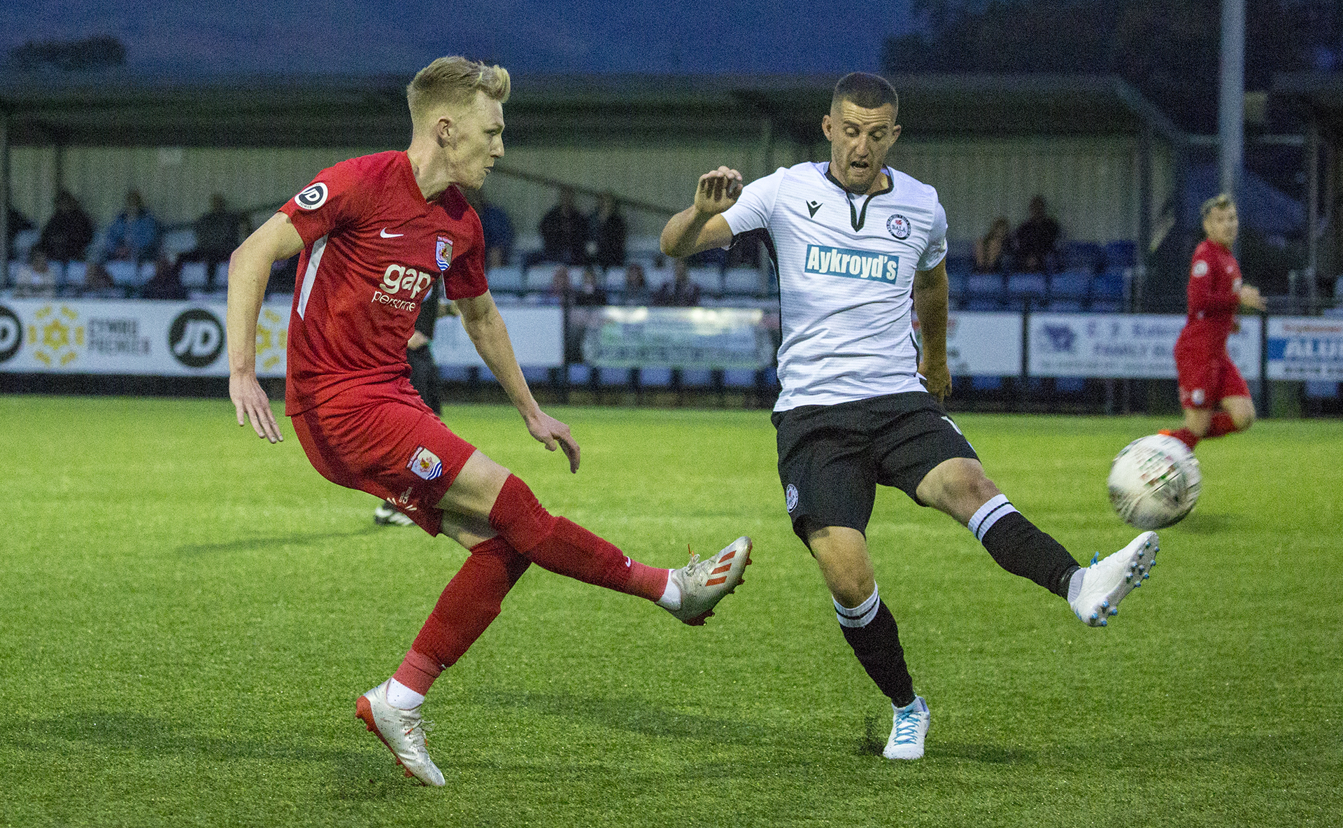 Declan Poole sends a searching cross into the Bala box | © NCM Media