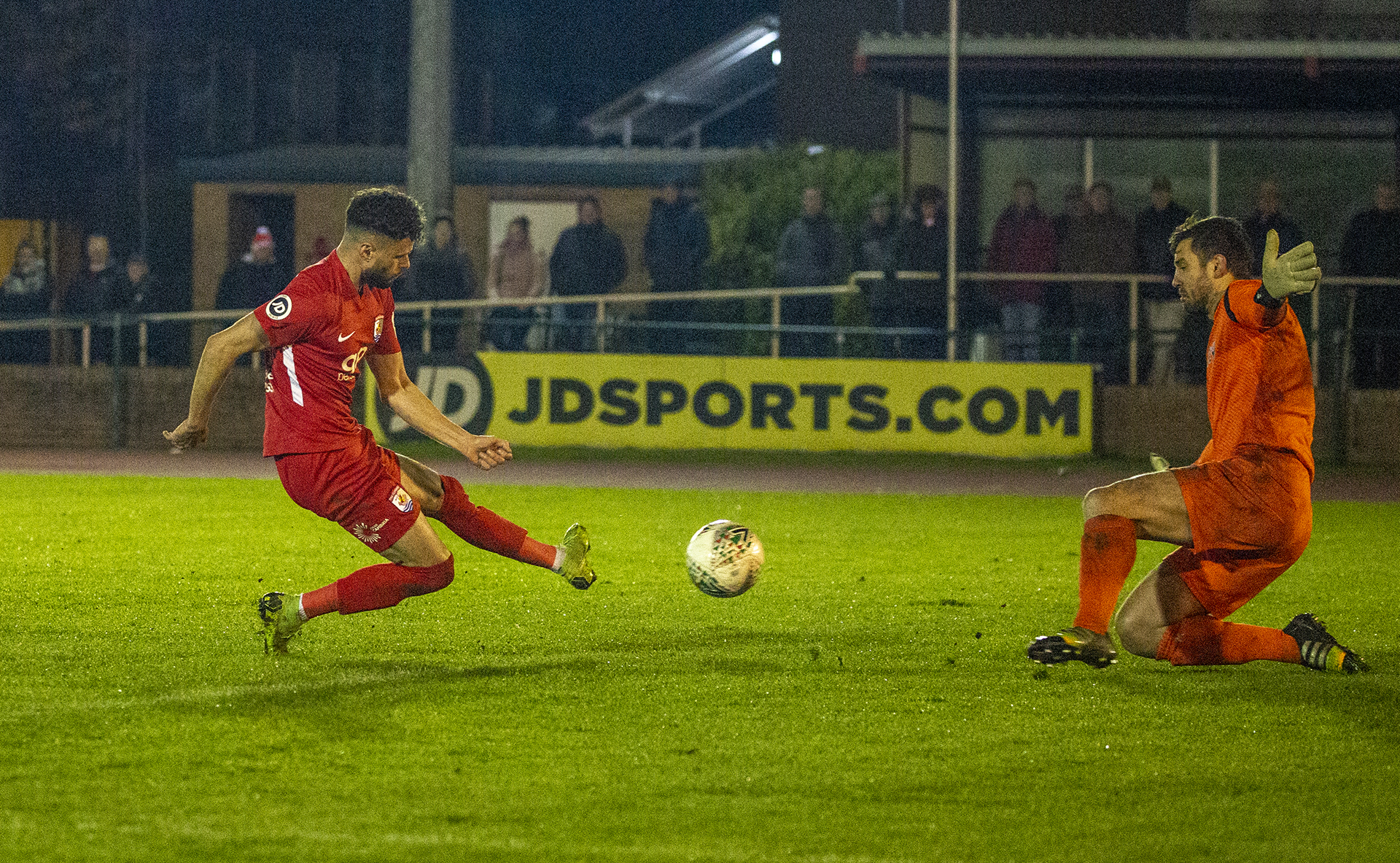 Nathan Woolfe slots past John Danby | © NCM Media