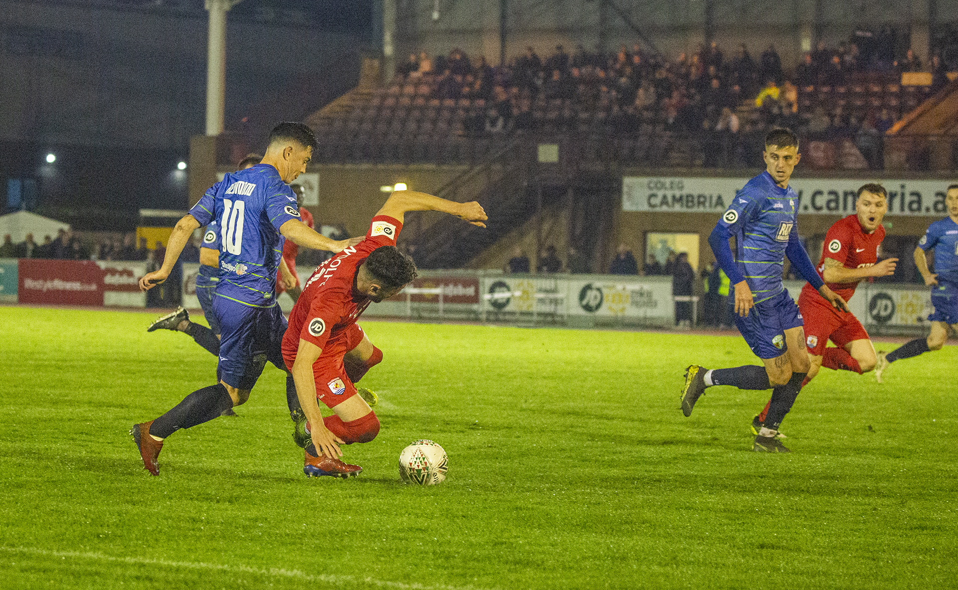 Nathan Woolfe was denied a penalty when he was felled by Danny Redmond inside the TNS box | © NCM Media