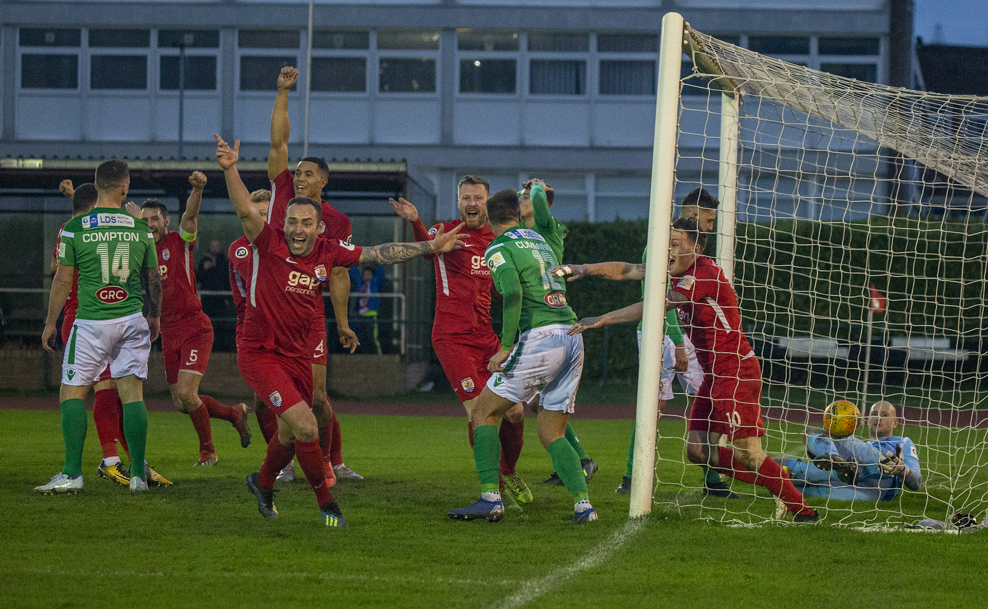 Nomads players celebrate the 91st minute goal which broke the deadlock | © NCM Media