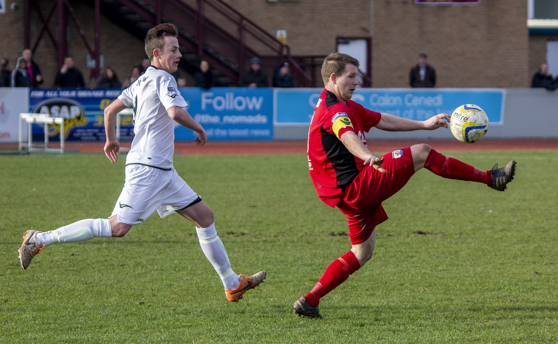 Ex-Nomads Captain, Craig Jones in action at Deeside Stadium against Afan Lido in March 2014 | © NCM Media