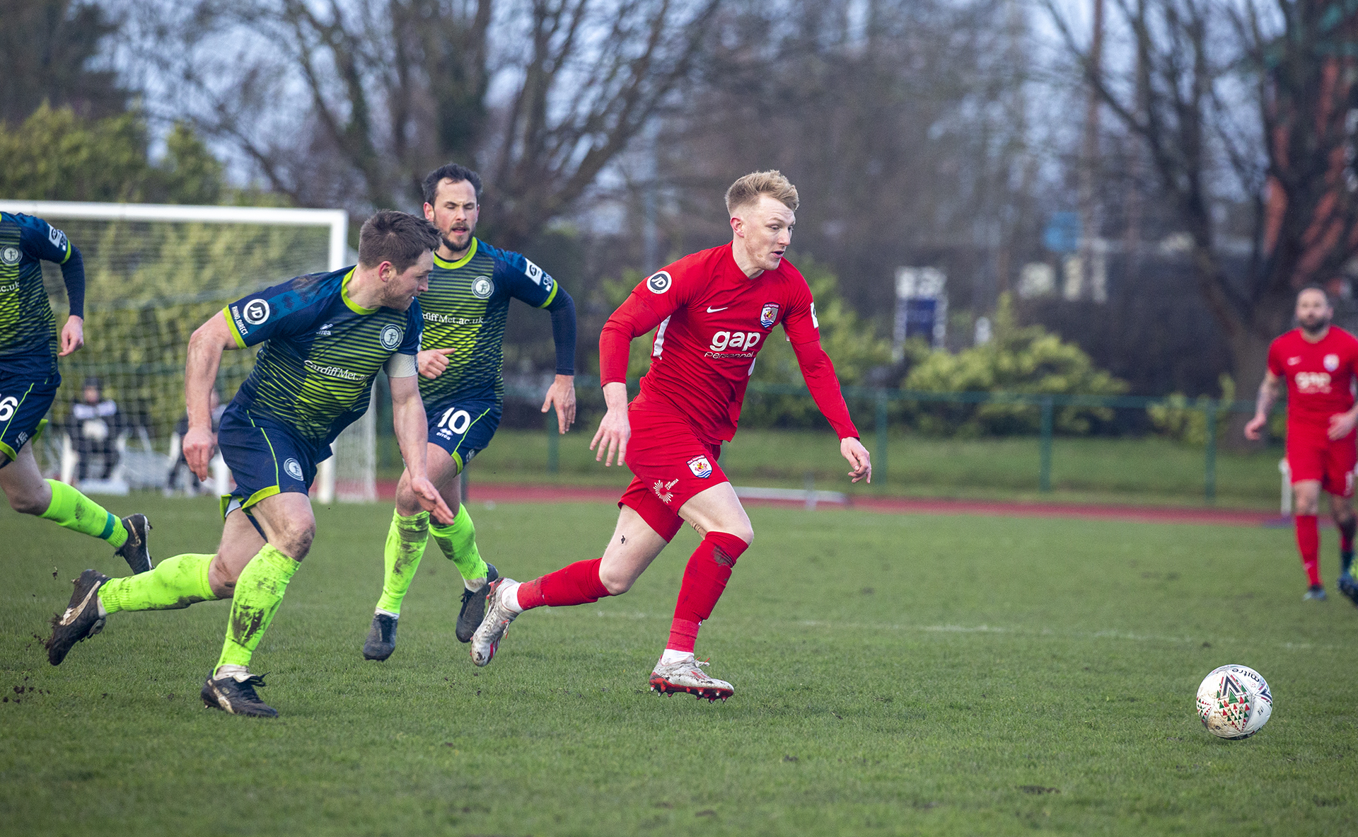 Declan Poole battles for possession | © NCM Media