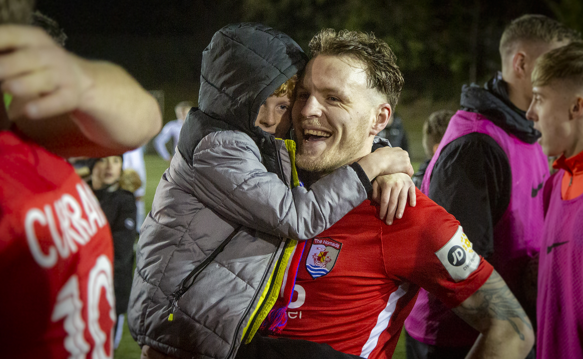Jamie Insall celebrates The Nomads' Nathaniel MG Cup victory with son Finley | © NCM Media