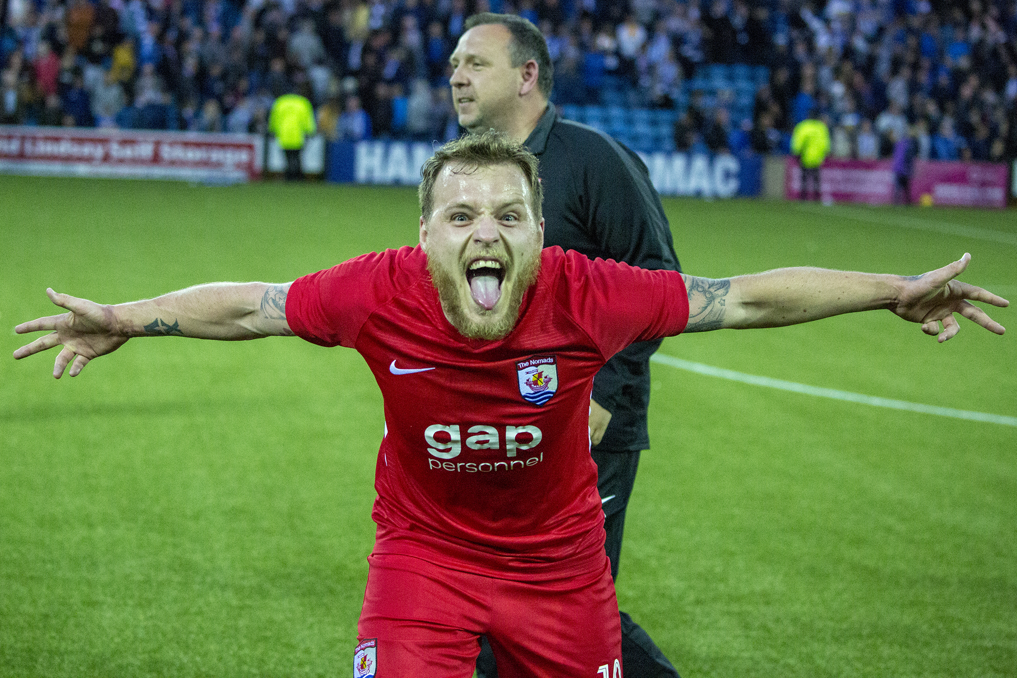 Jamie Insall celebrates Connah's Quay Nomads' victory over Kilmarnock in the Europa League | © NCM Media