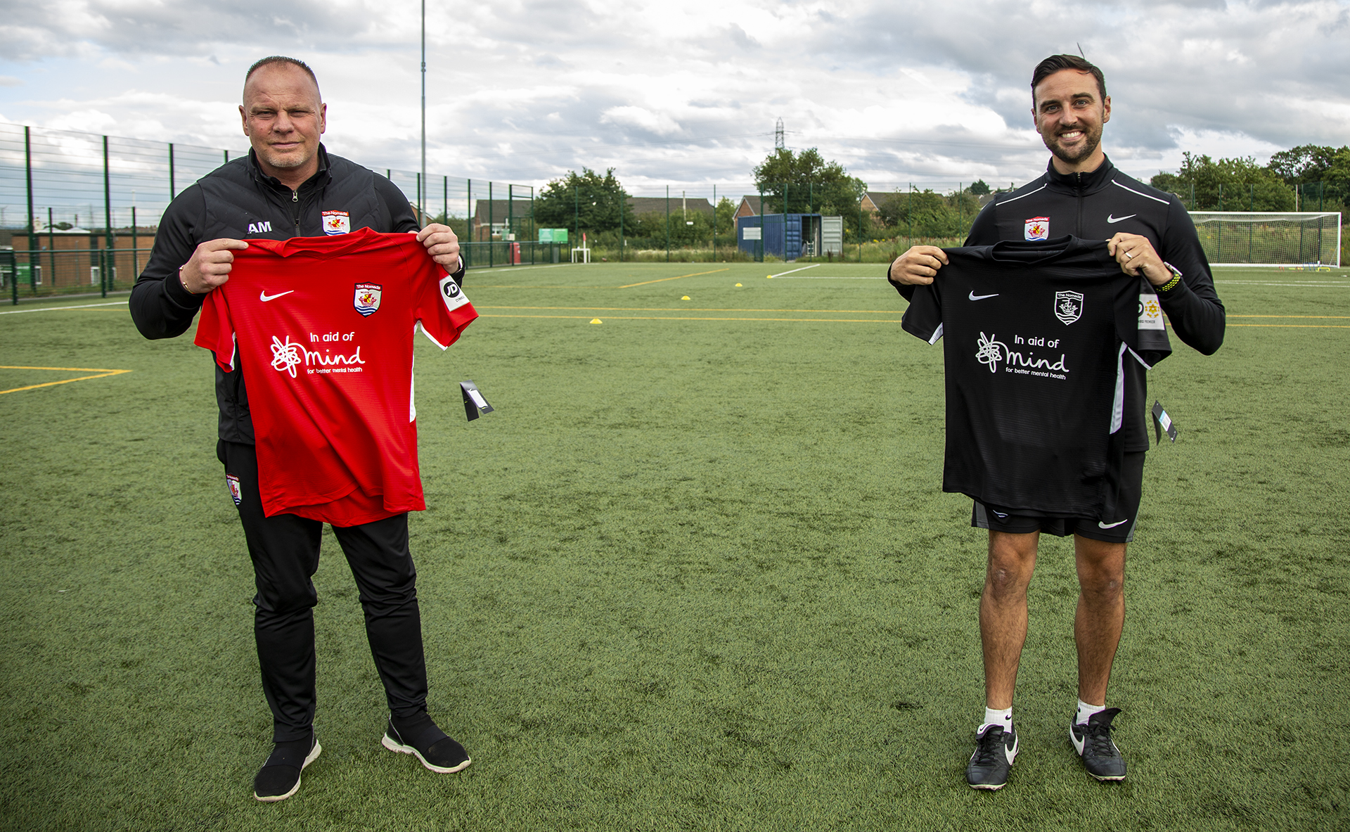 Manager Andy Morrison with Director of Football Jay Catton displaying the new shirts | © NCM Media