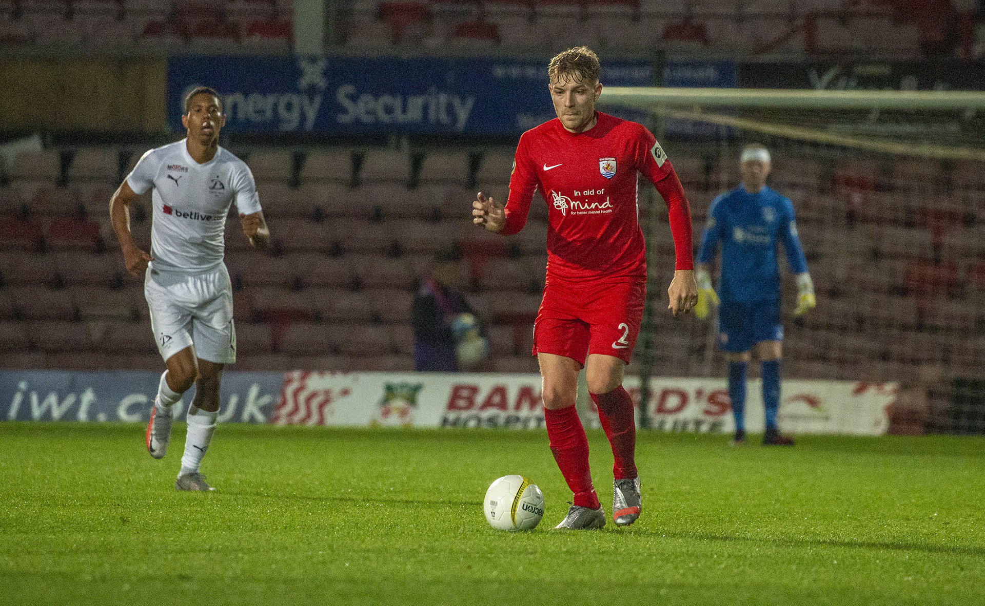 John Disney brings the ball out of defence for The Nomads | © NCM Media