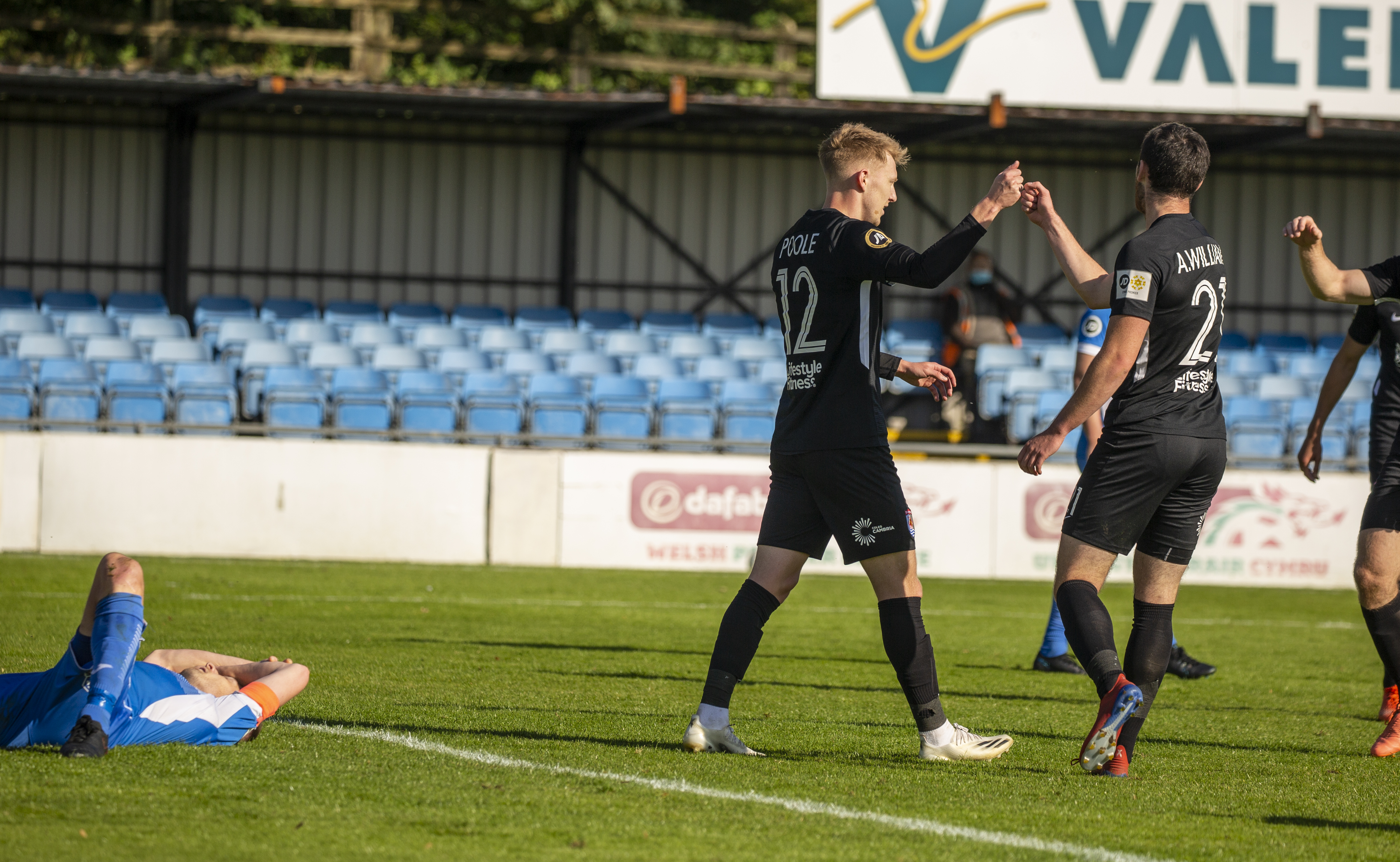 Declan Poole celebrates his late strike | © NCM Media